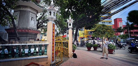 Tourist Photographing Duc's Shrine
