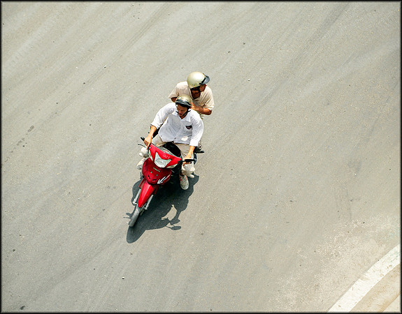 Men on Red Motorbike Saigon