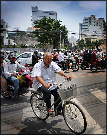 Old Man in Sea of Traffic